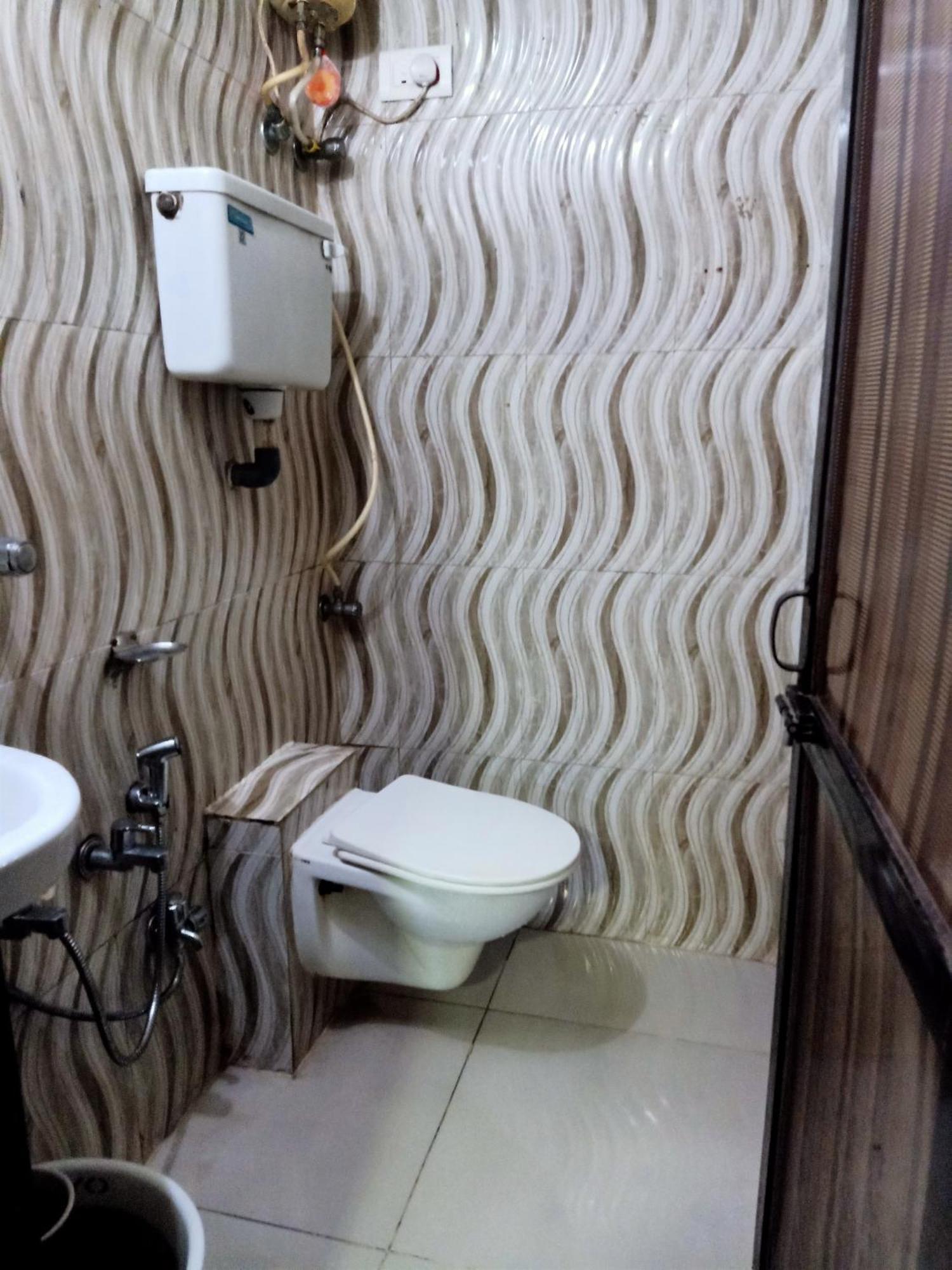 Hotel Central Inn Mumbai Szoba fotó