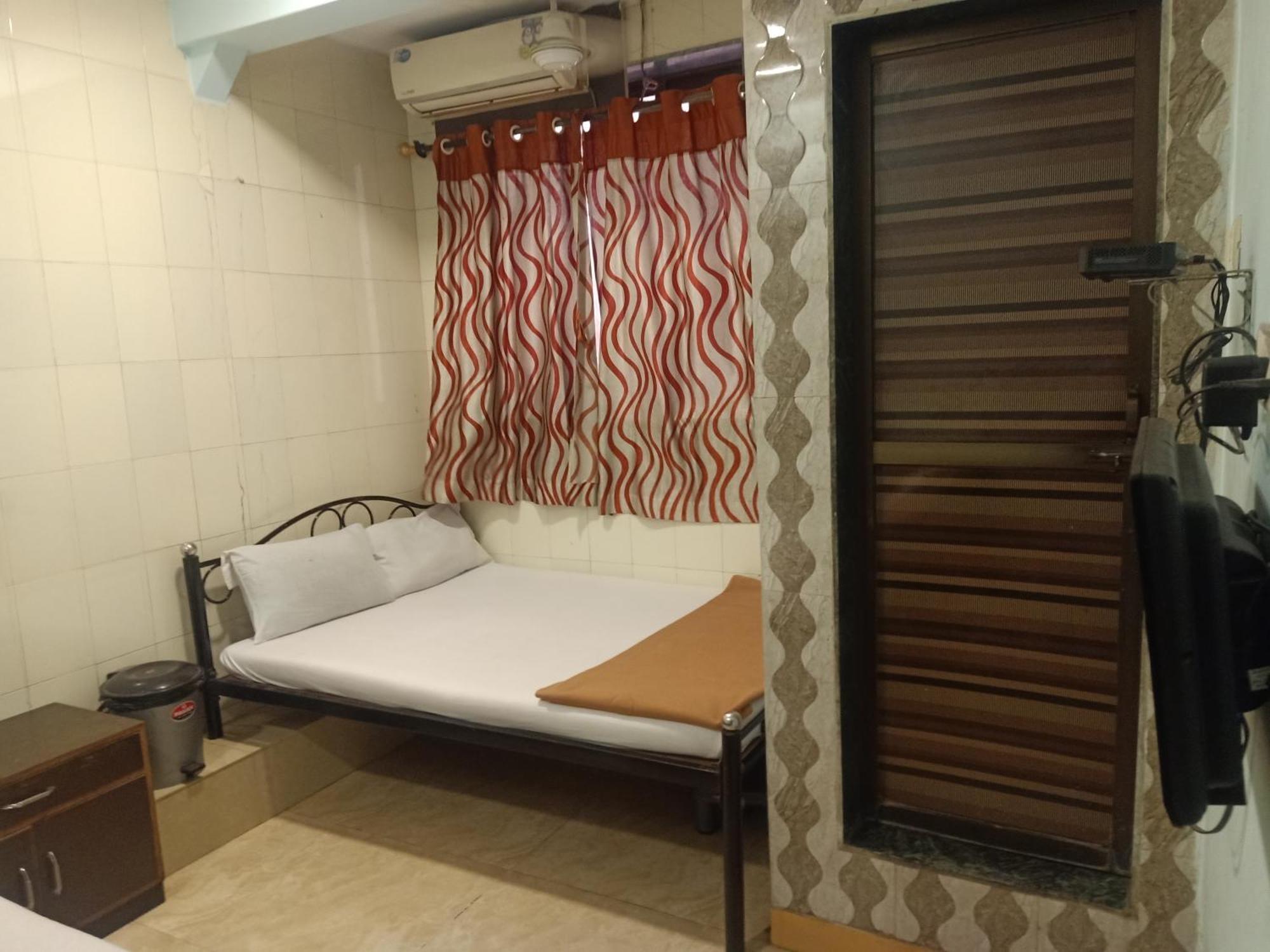 Hotel Central Inn Mumbai Szoba fotó